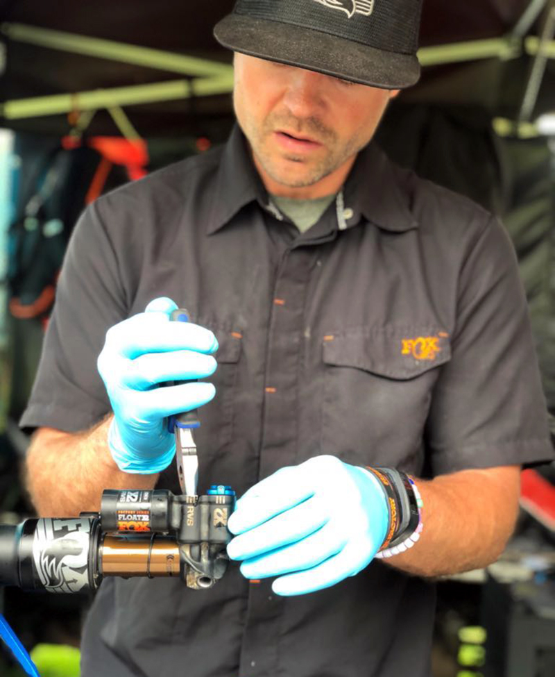 Peter Gustafson tuning up a bike